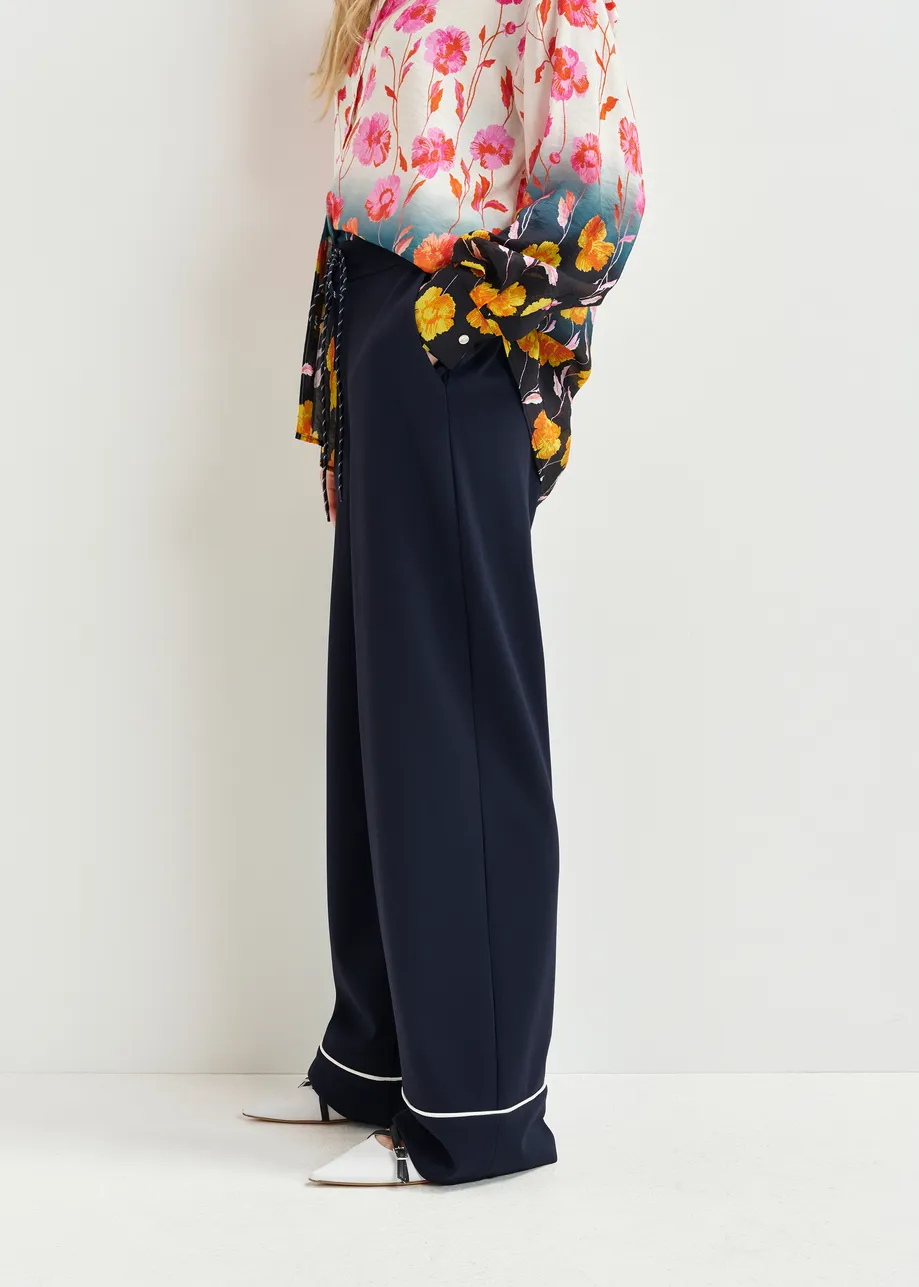 Dark blue and white wide-leg pants with contrasting trim