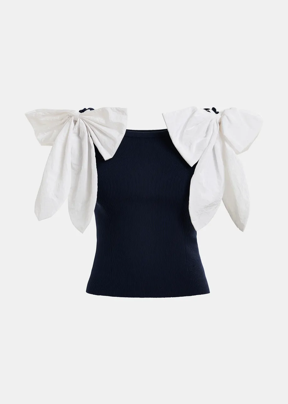 Dark blue and white off-the-shoulder knitted top with bow detail