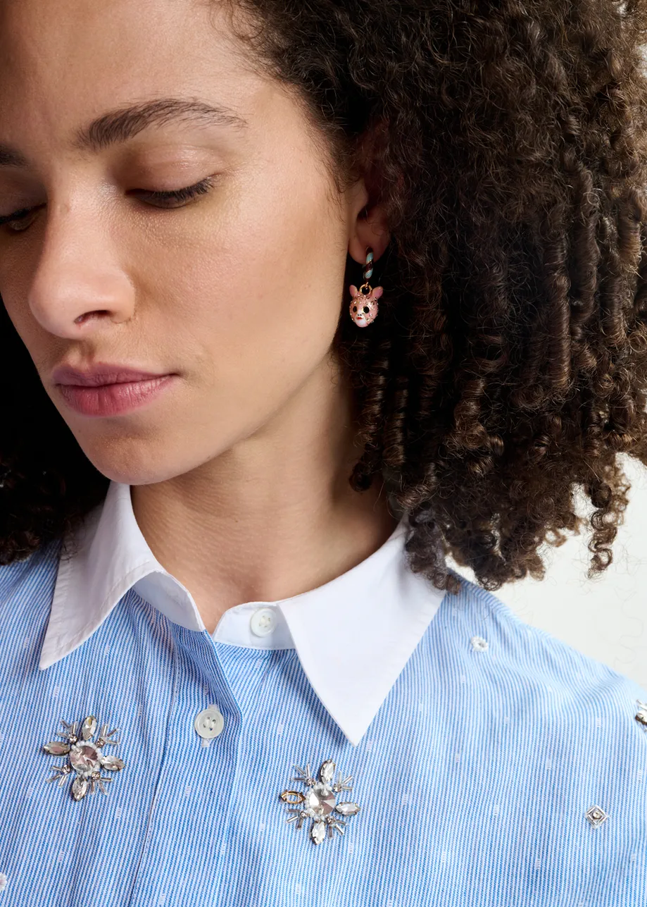Blue and brown hoop earrings with pie and doll pendants