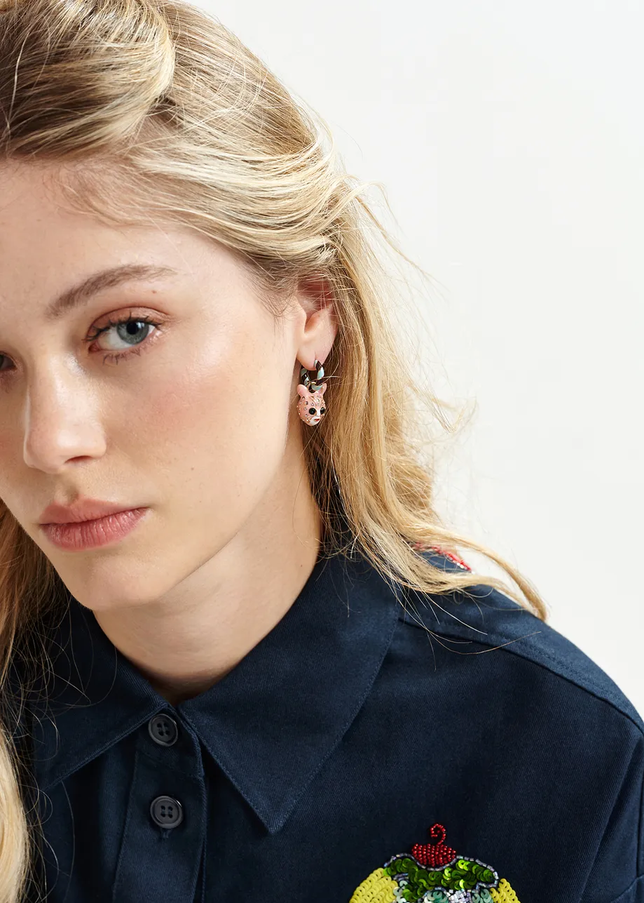 Blue and brown hoop earrings with pie and doll pendants