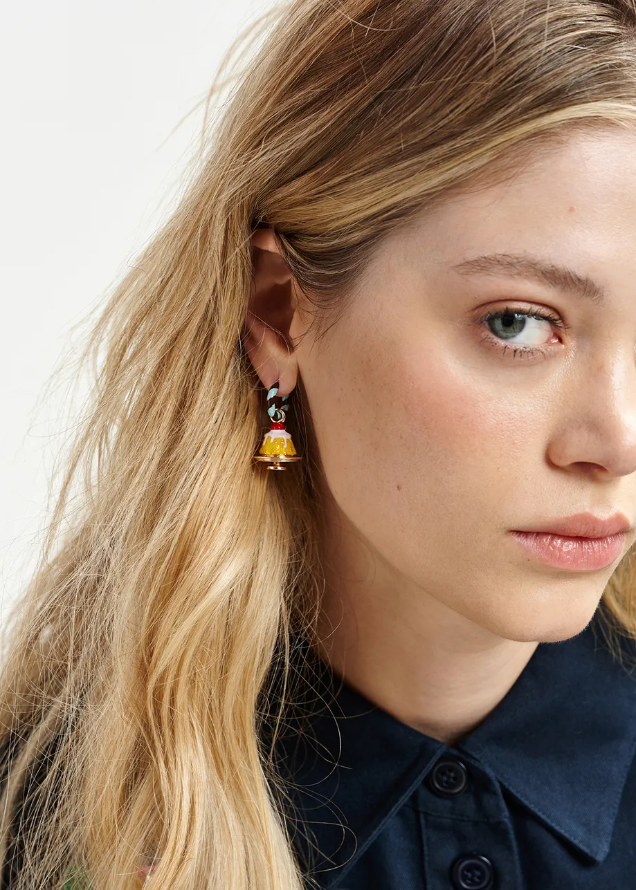 Blue and brown hoop earrings with pie and doll pendants