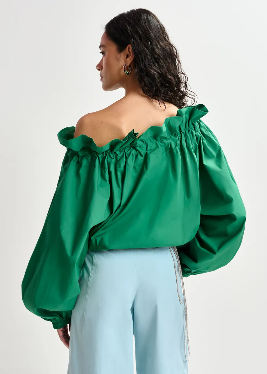 Green cotton top with ruffle details, voluminous sleeves, and self-tie collar