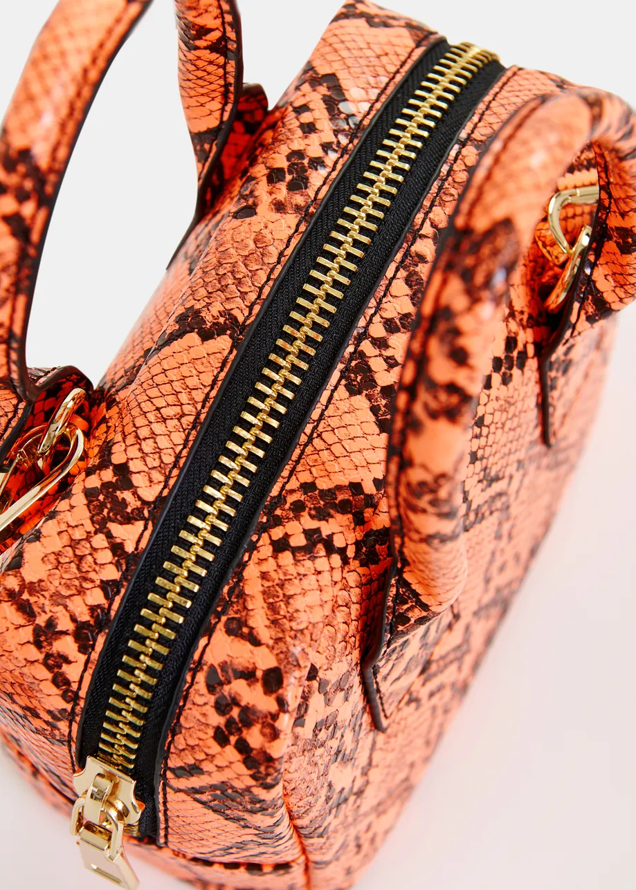 Orange and black snake print mini bag