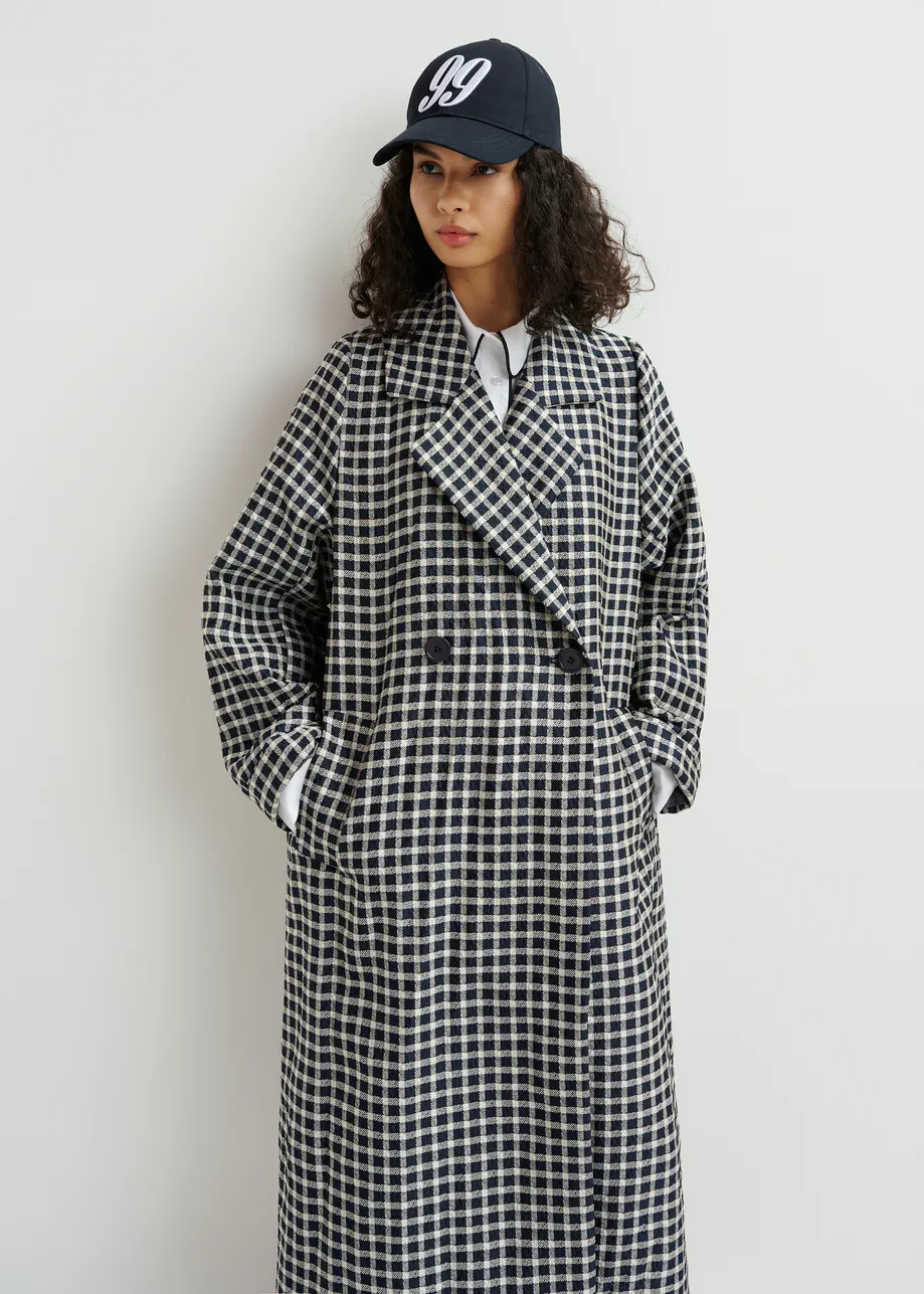 Dark blue and off-white double-breasted coat with check pattern