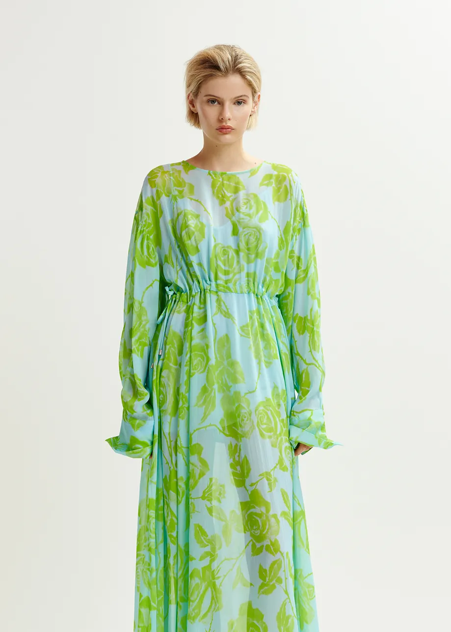 Lichtblauwe en groene maxi-jurk met bloemenprint