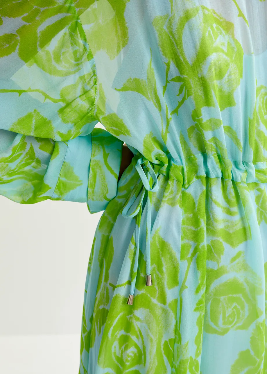 Lichtblauwe en groene maxi-jurk met bloemenprint