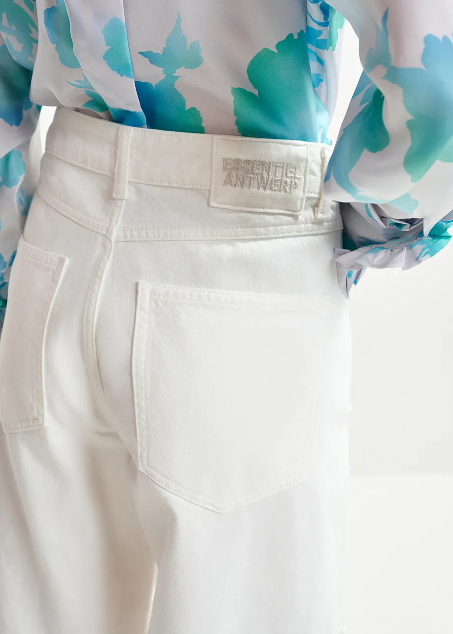 White straight-leg patchwork jeans