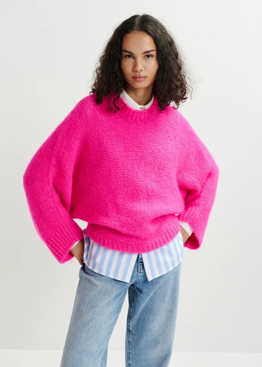 Bright pink mohair blend knit with batwing sleeves