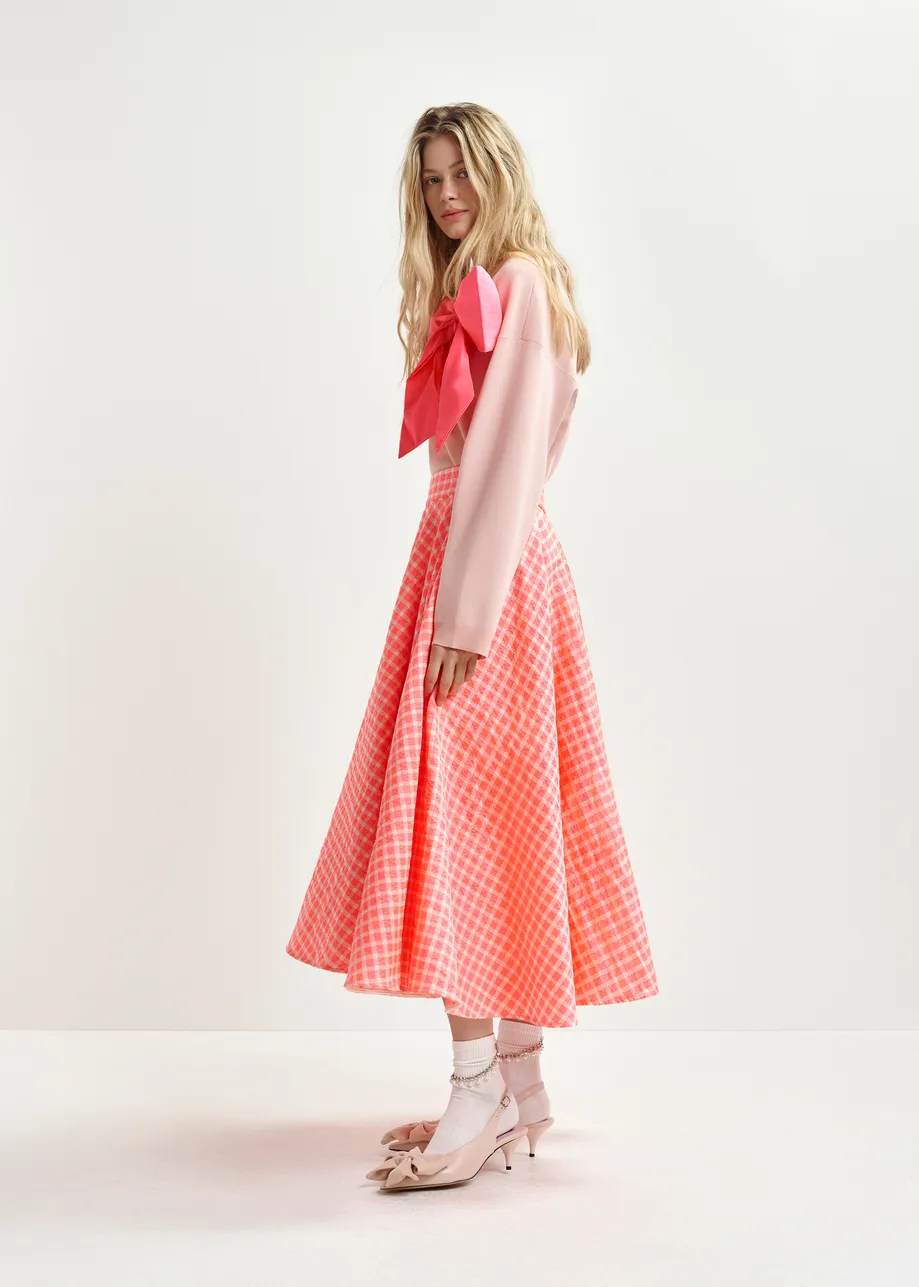 Orange and light pink pleated midi skirt with check pattern