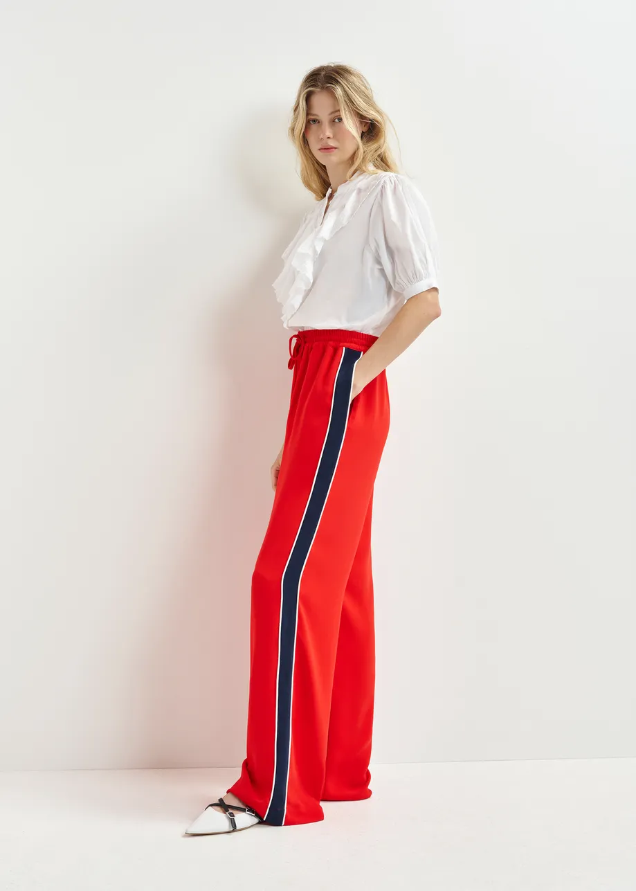 Red, dark blue and white wide-leg track pants with off-white stripes