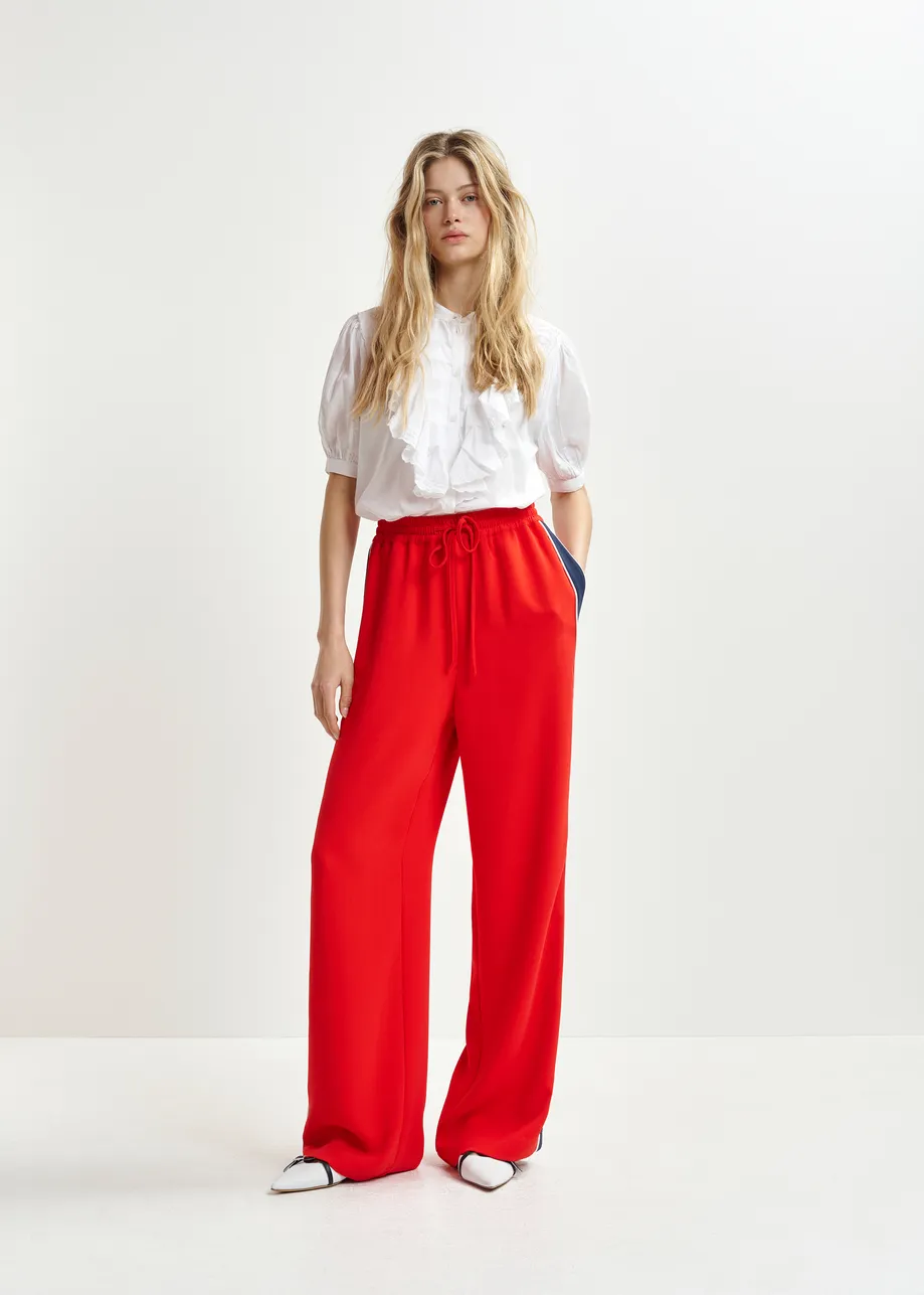 Red, dark blue and white wide-leg track pants with off-white stripes