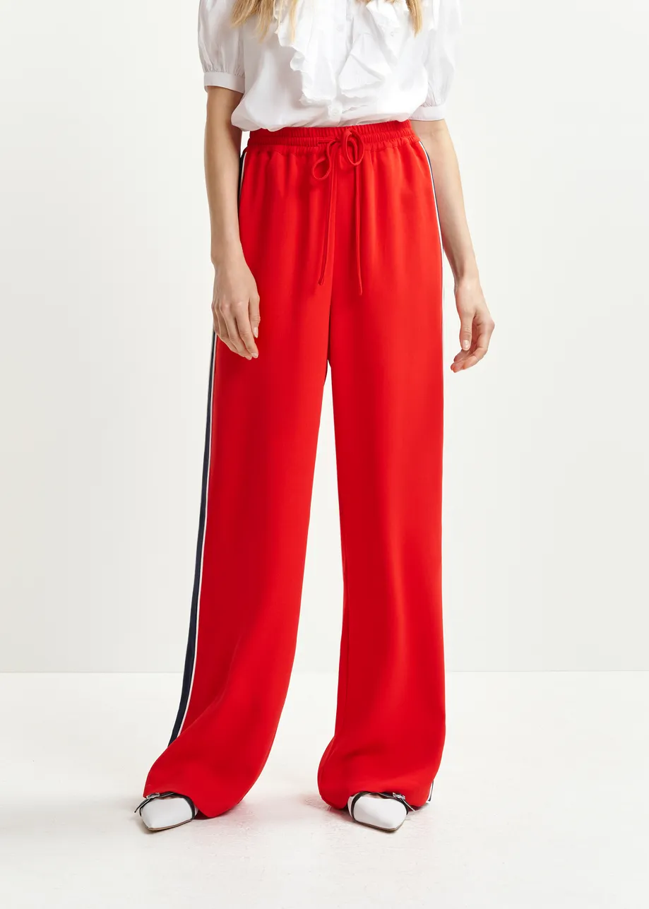 Red, dark blue and white wide-leg track pants with off-white stripes