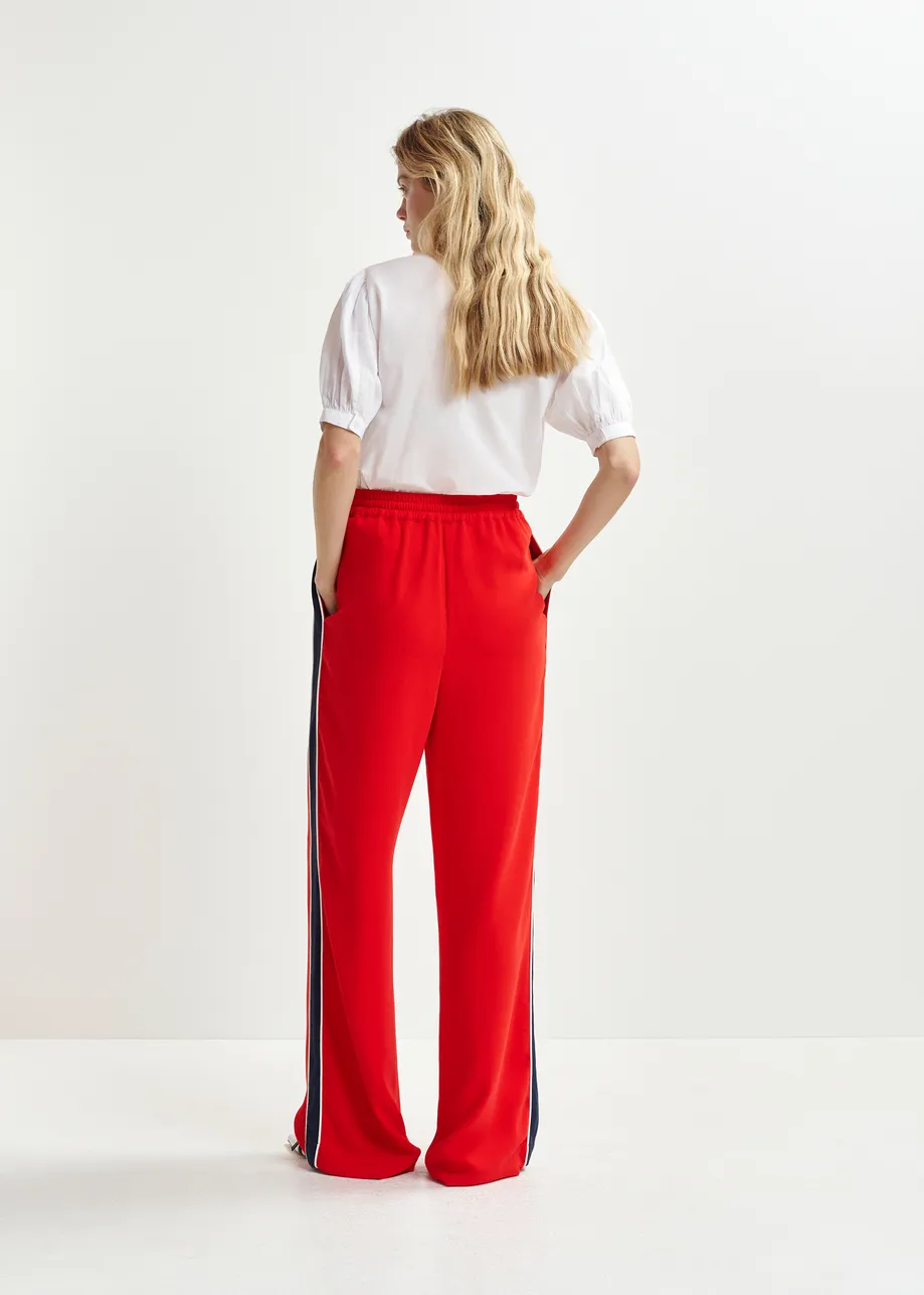 Red, dark blue and white wide-leg track pants with off-white stripes