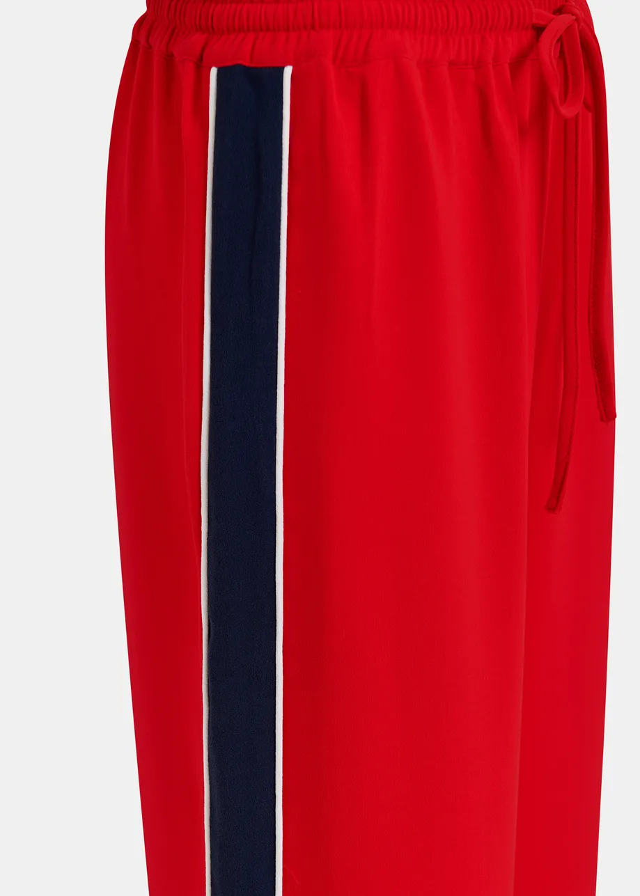 Red, dark blue and white wide-leg track pants with off-white stripes