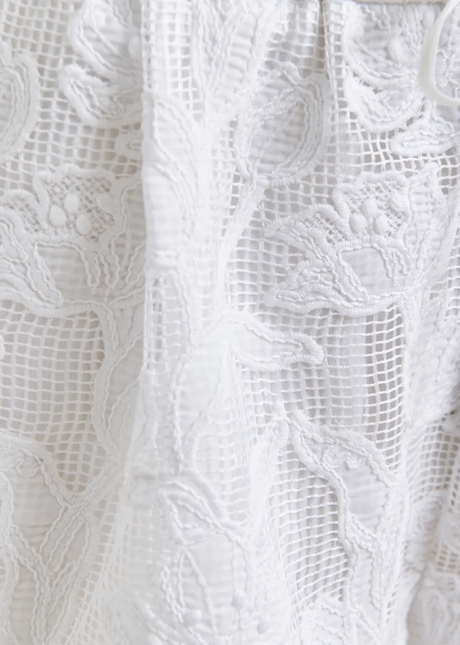 White lace wide-leg shorts