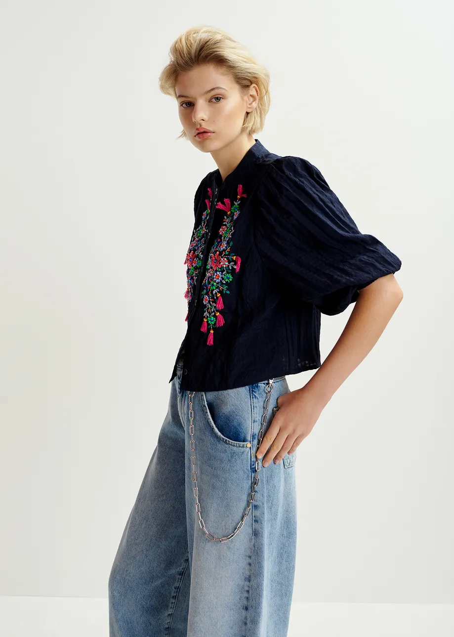 Dark blue sequin and bead-embellished shirt with voluminous sleeves