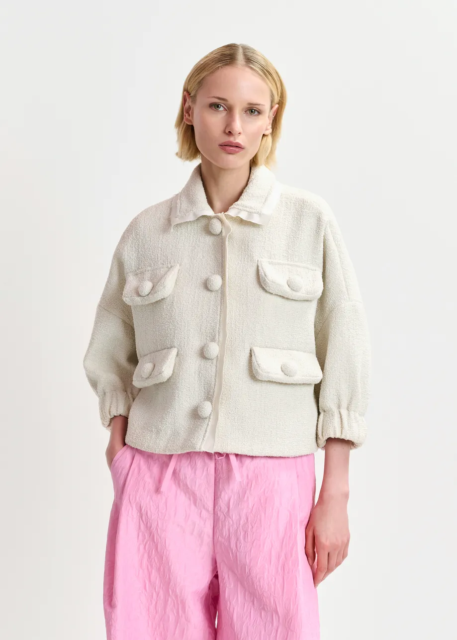 Off-white oversized jacket with 3/4 length voluminous sleeves