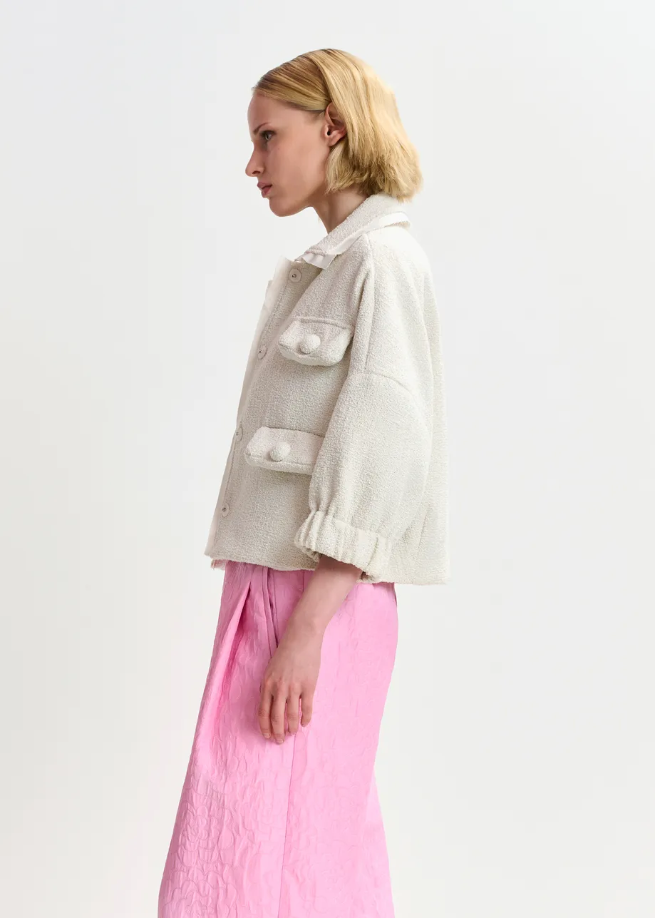 Off-white oversized jacket with 3/4 length voluminous sleeves