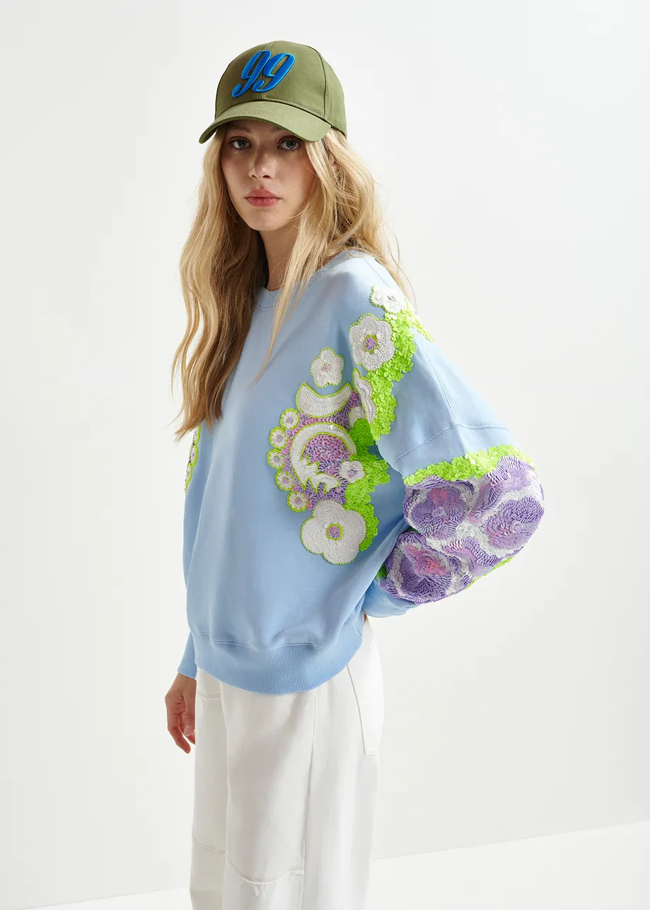 Light blue, green and purple organic cotton sweatshirt with sequin and bead-embroidered sleeves