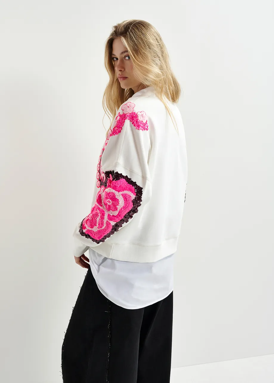 White, pink and burgundy organic cotton sweatshirt with sequin and bead-embroidered sleeves