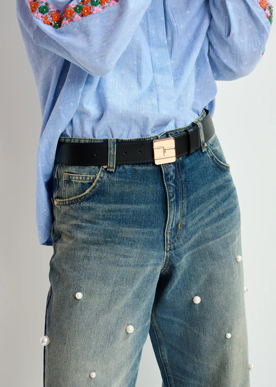 Black leather belt with E-shaped buckle