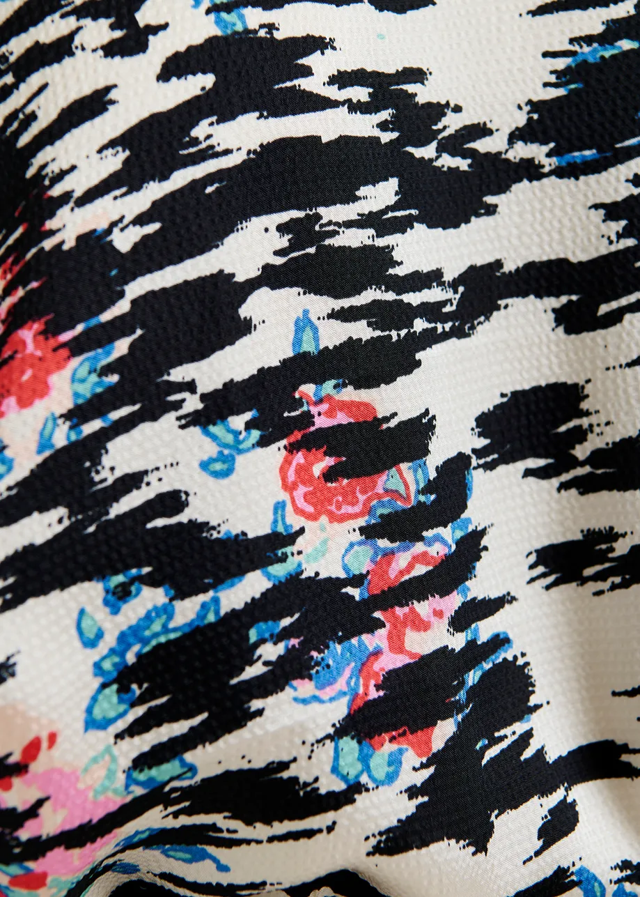Robe mi-longue à imprimé graphique noir, blanche et multicolore