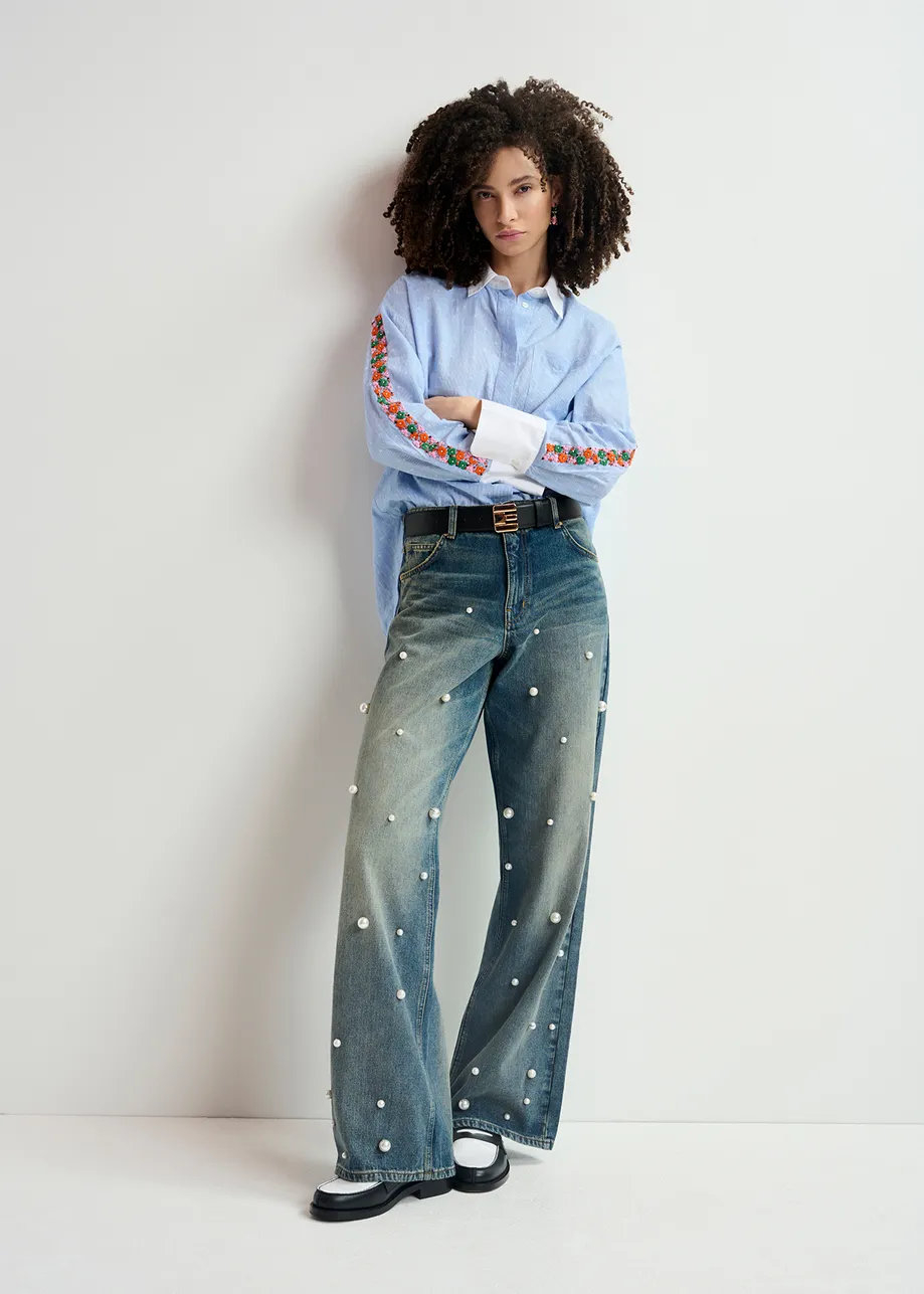 Blue pearl-embellished jeans