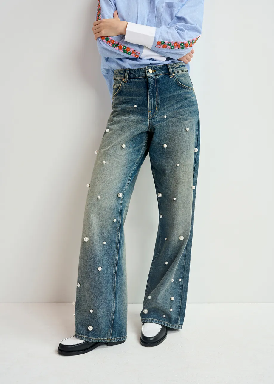 Blue pearl-embellished jeans