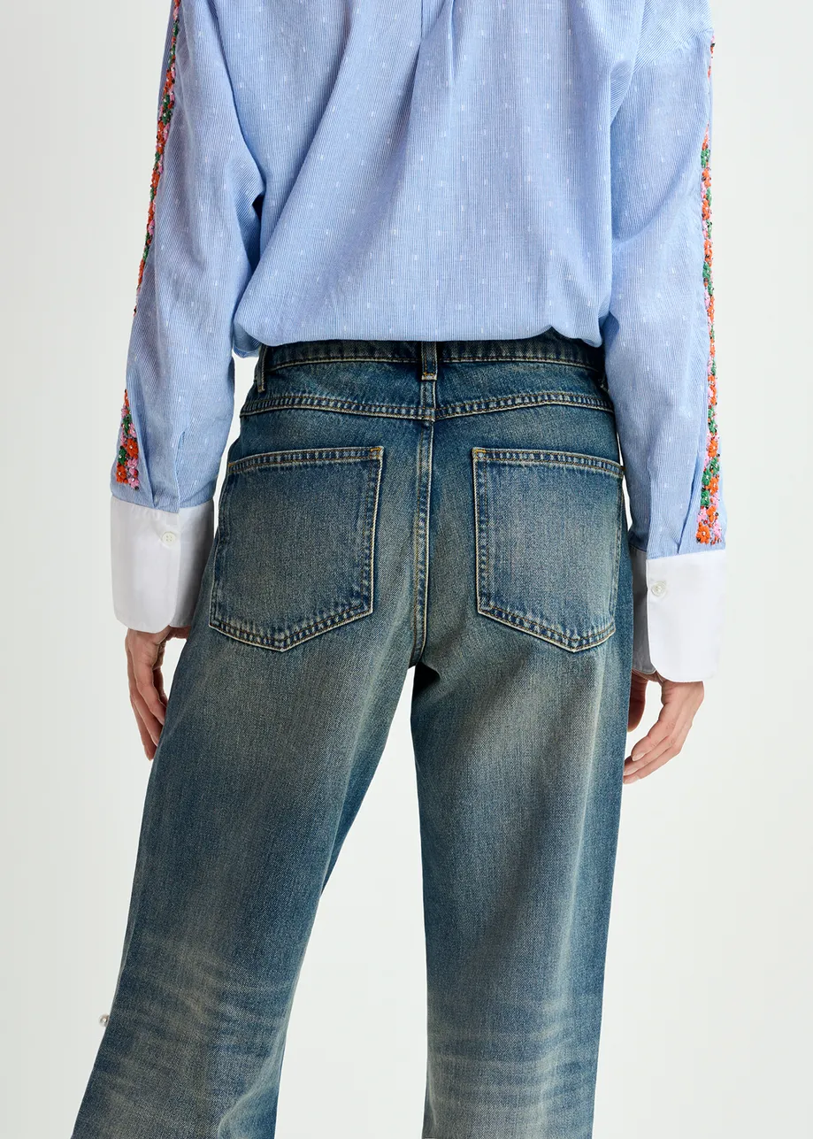 Blue pearl-embellished jeans