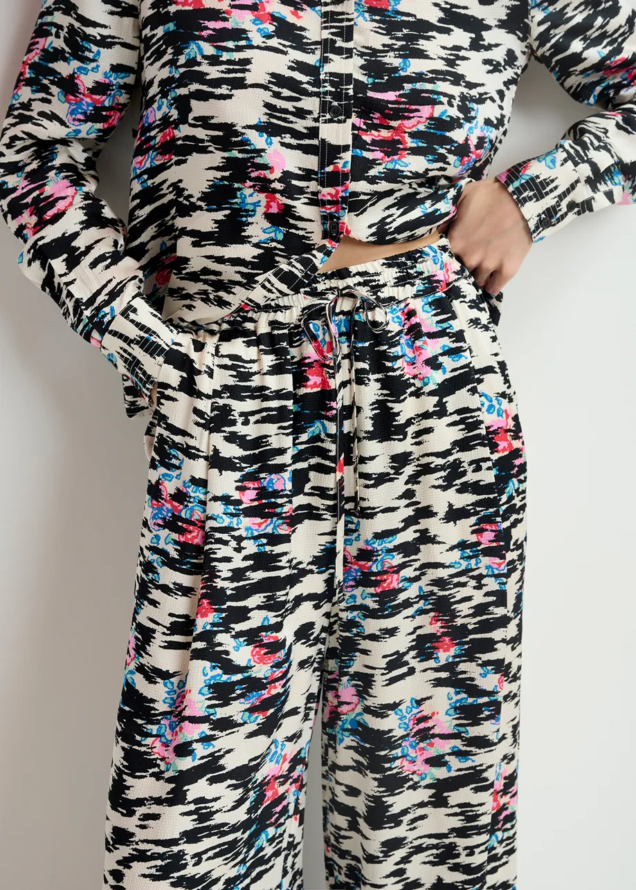 Black, white and multicolored zebra-print wide-leg pants