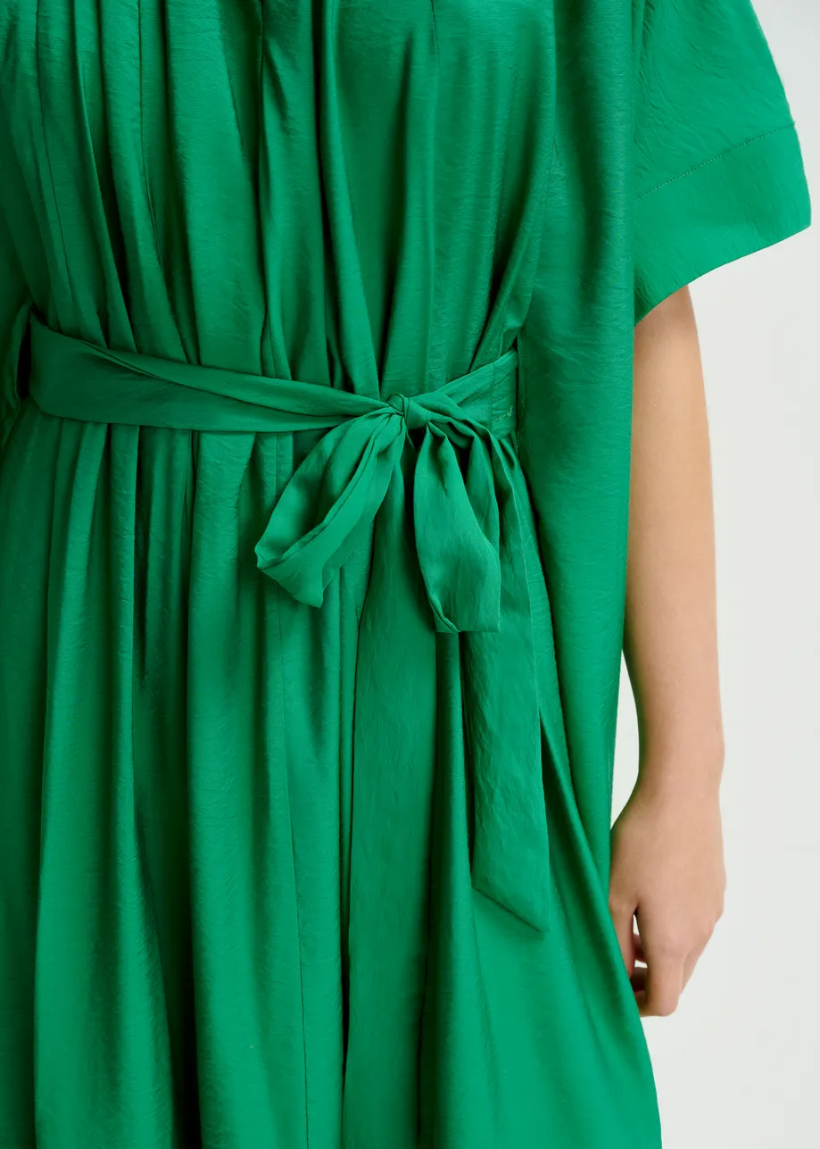 Green oversized ruffled dress