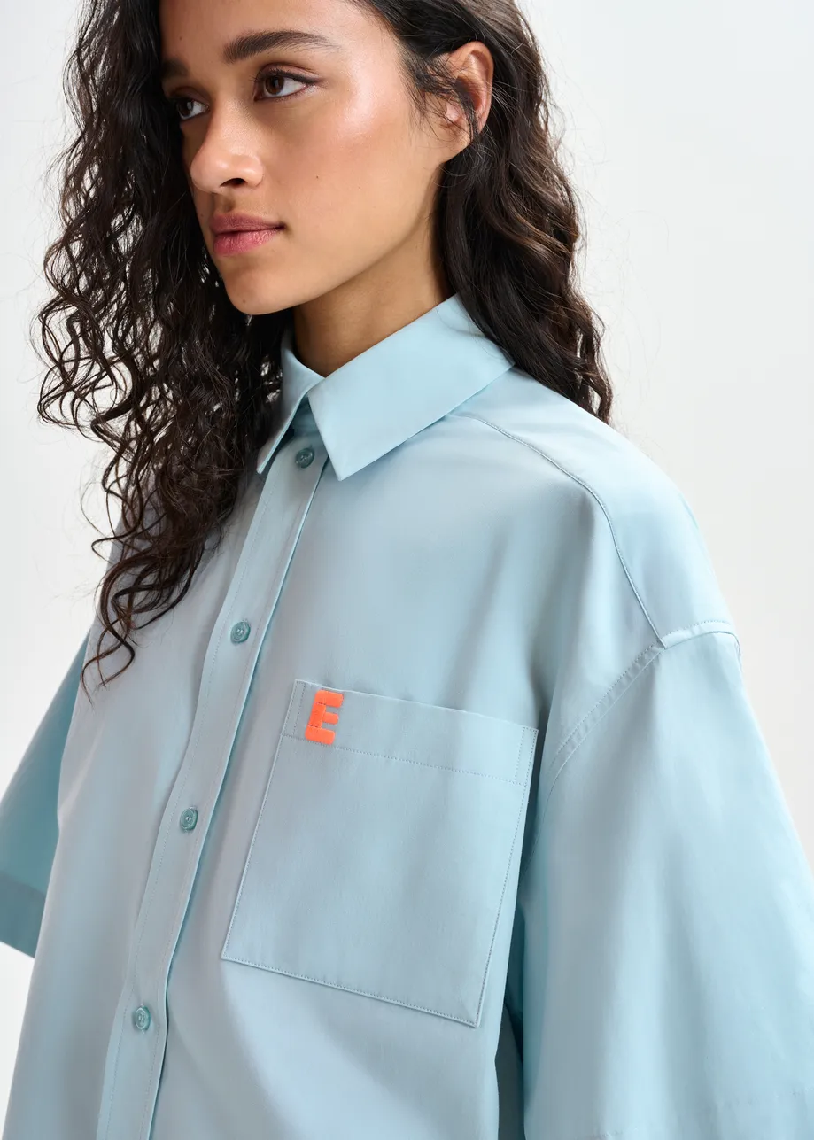 Teal cotton shirt with embroidered detail