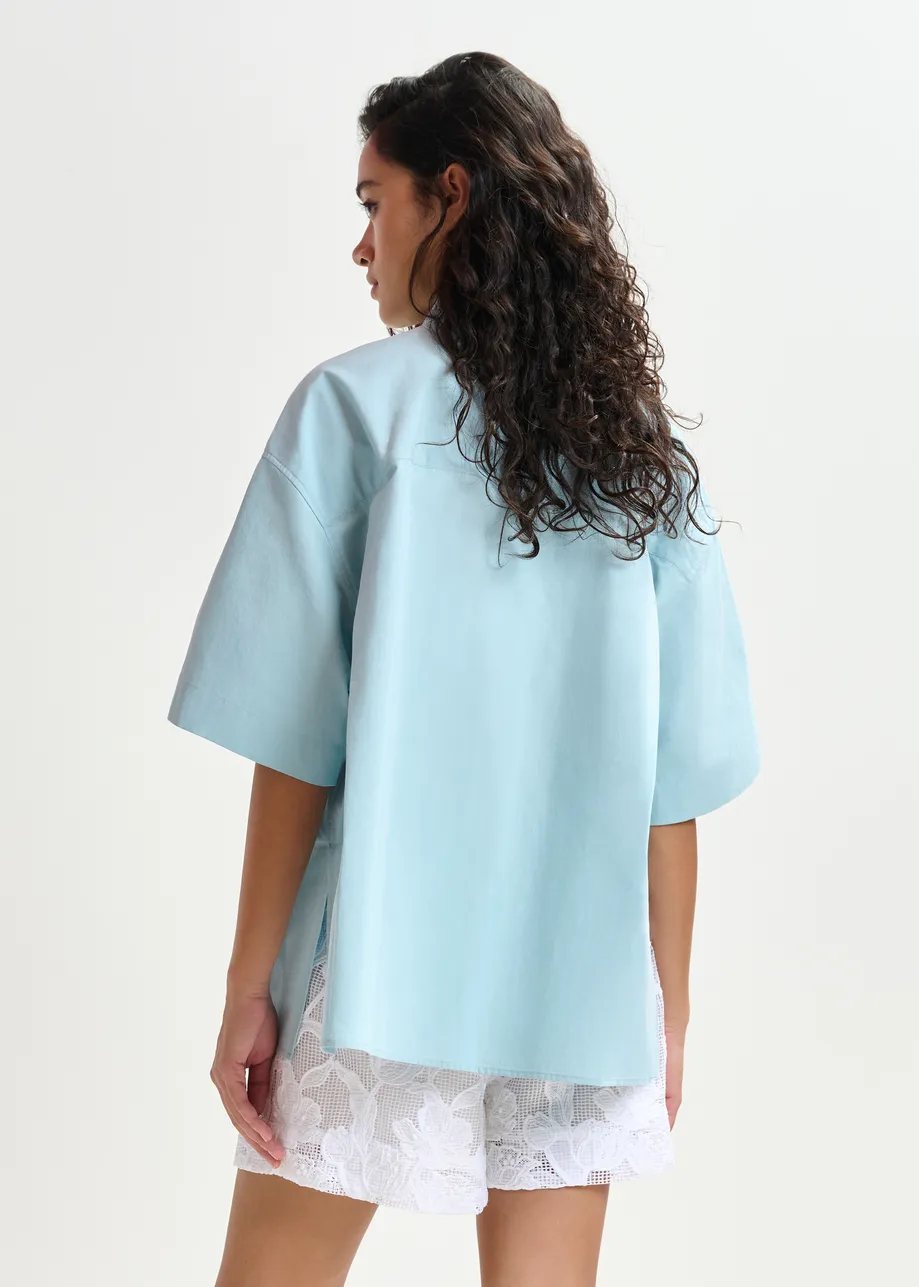 Teal cotton shirt with embroidered detail