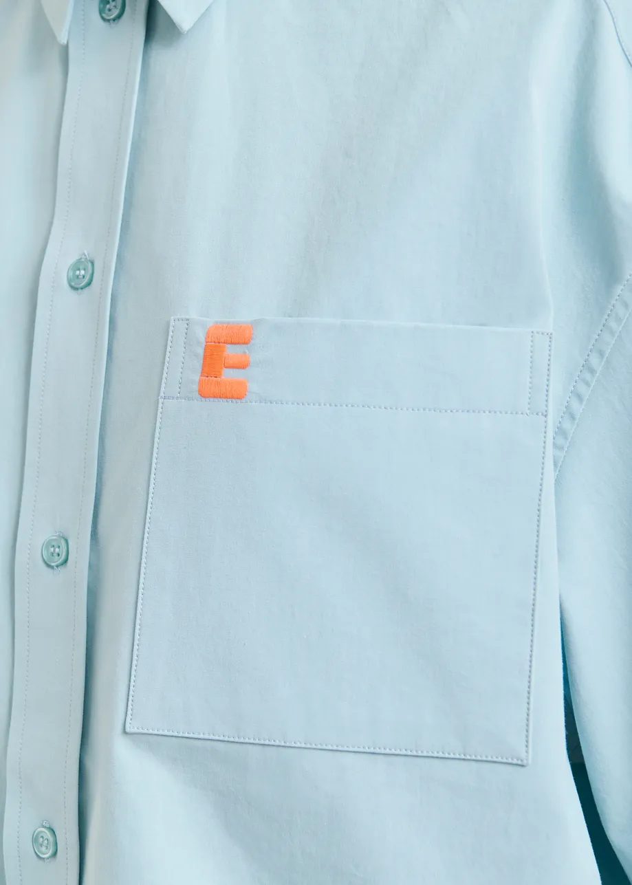 Teal cotton shirt with embroidered detail