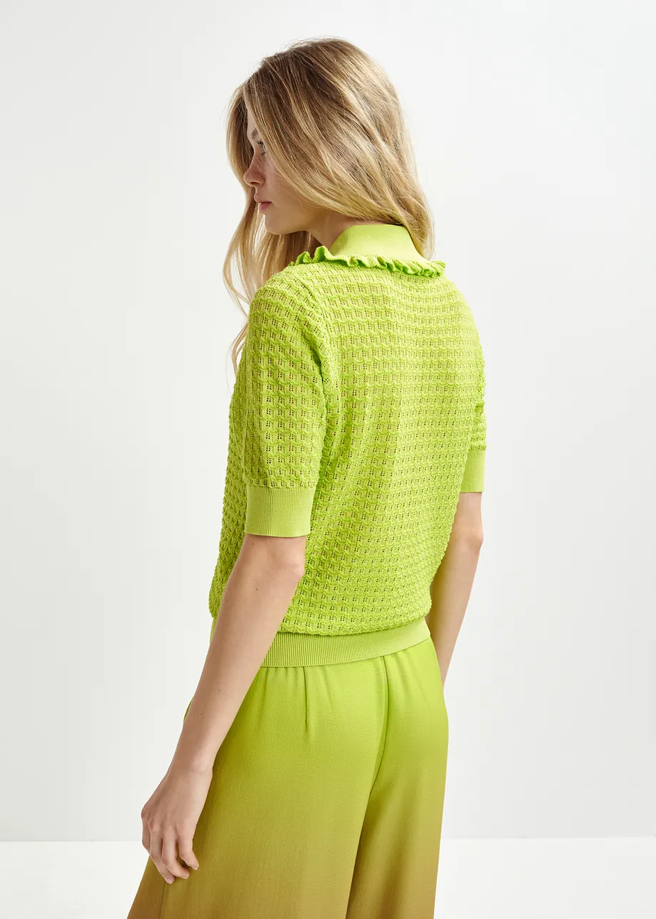 Lime green polo with ruffles and rhinestone-embellished buttons