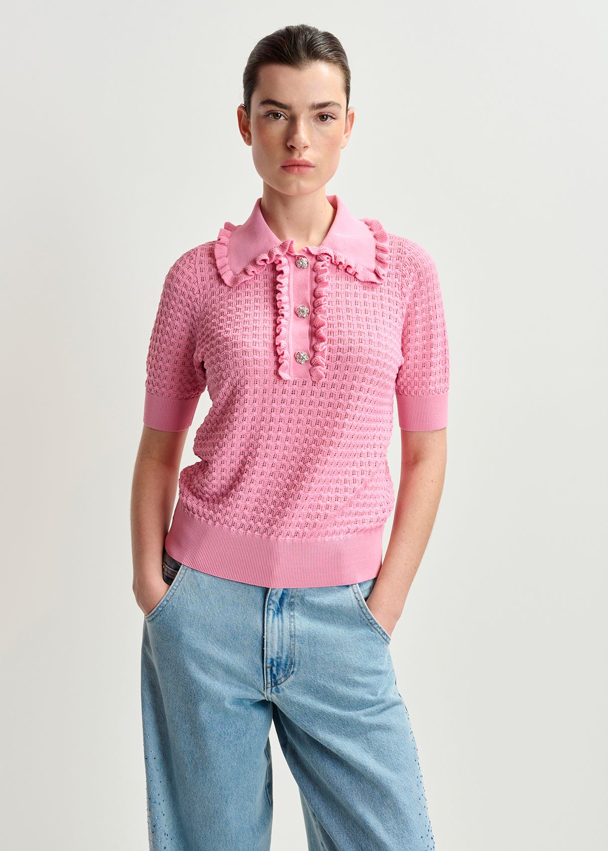 Light pink polo with ruffles and rhinestone-embellished Light pink polo with ruffles and rhinestone-embellished