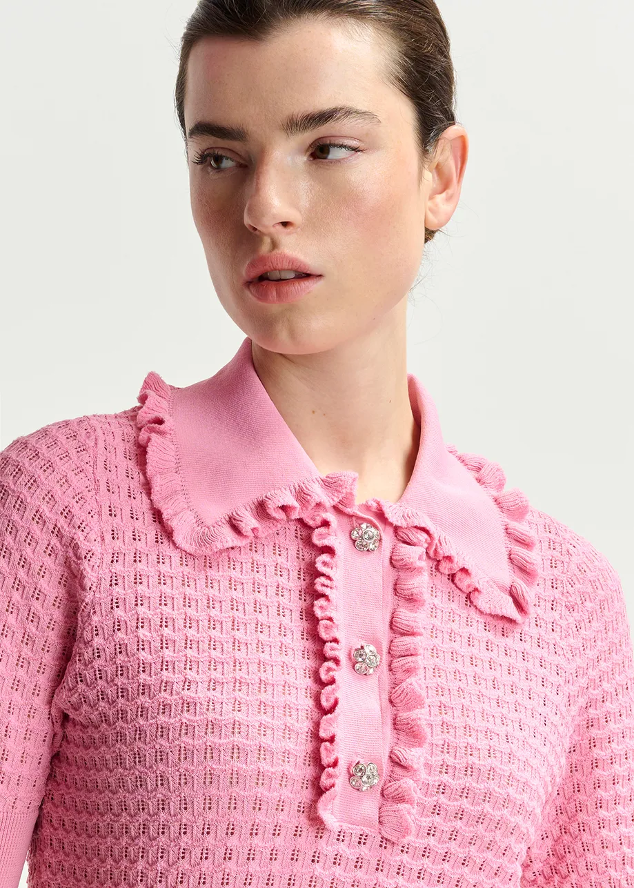 Light pink polo with ruffles and rhinestone-embellished buttons