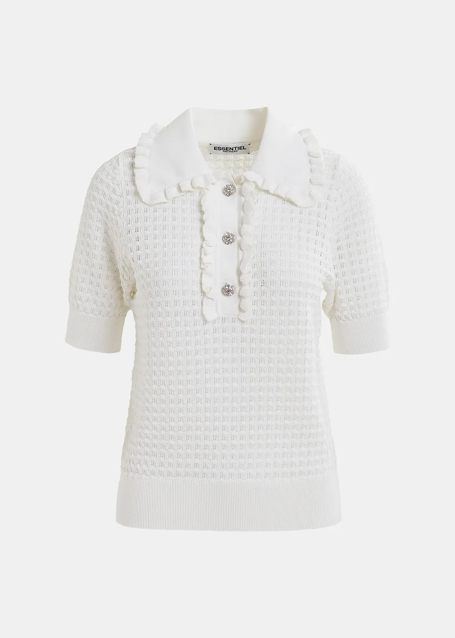 Off-white polo with ruffles and rhinestone-embellished buttons