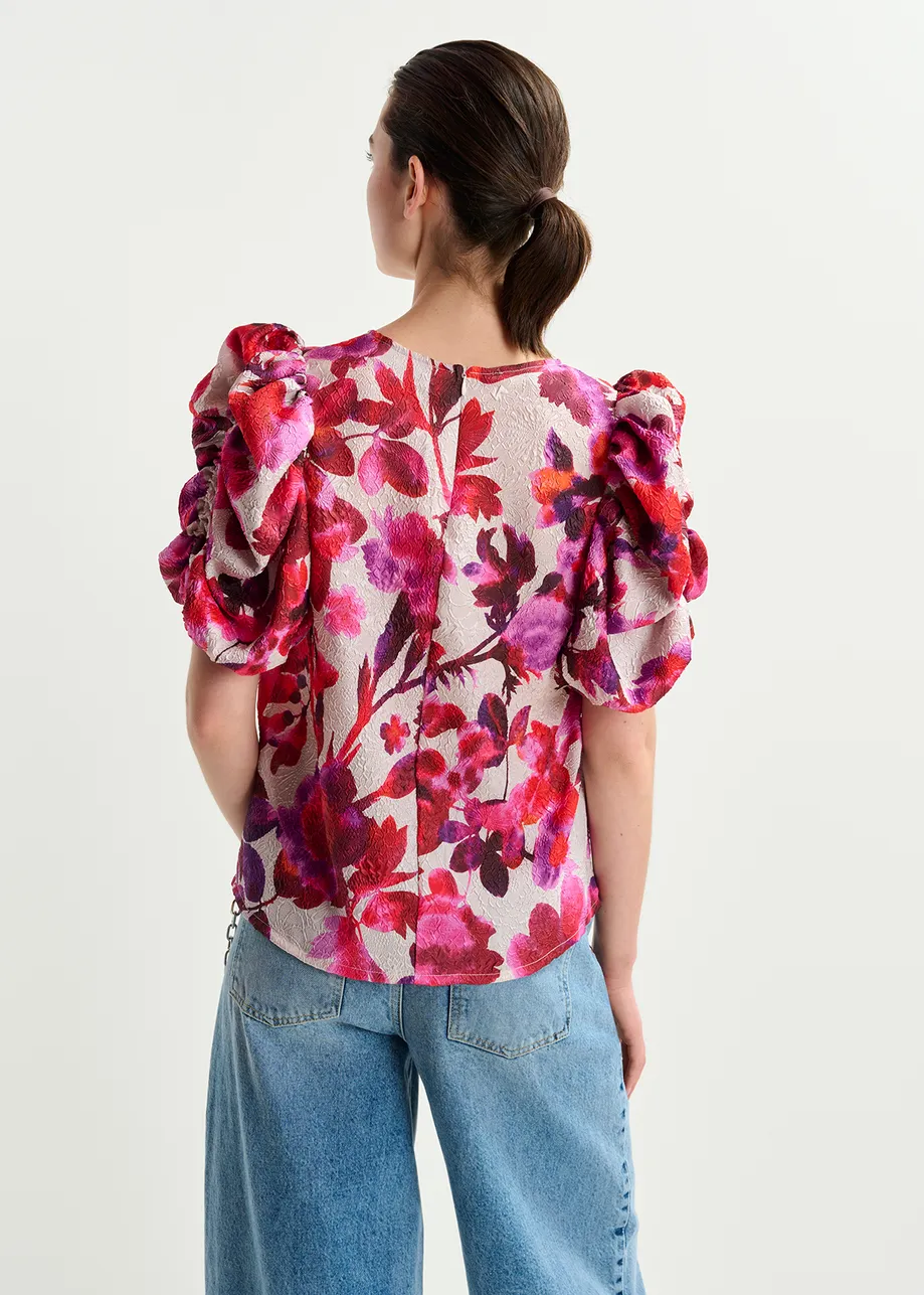 Off-white, pink and purple jacquard top with voluminous sleeves