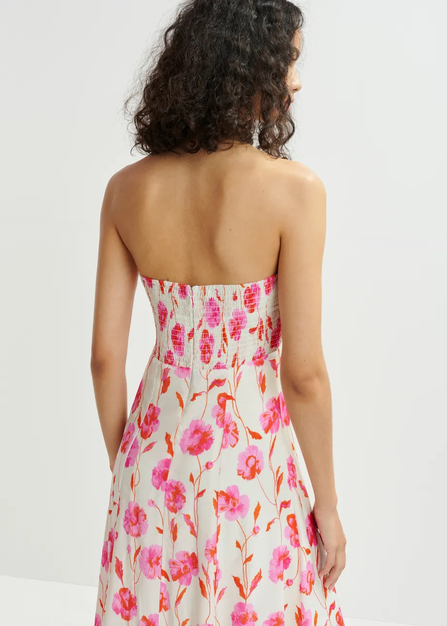 Gebroken witte, roze en zwarte strapless maxi-bloemenjurk van satijn