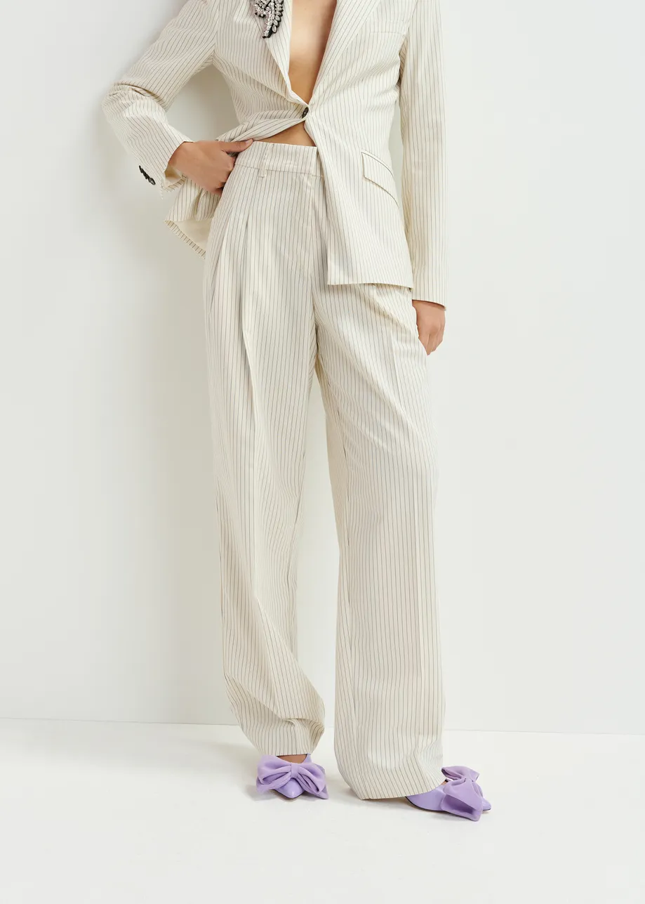 Off-white and black pinstriped tapered leg pants