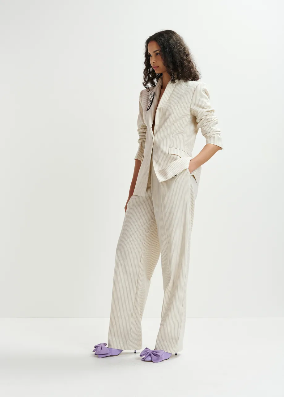 Off-white and black pinstriped tapered leg pants
