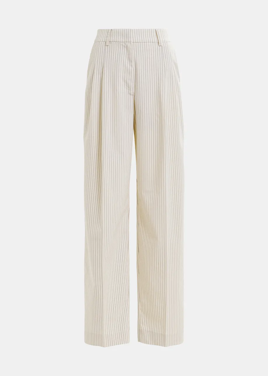 Dark blue and white pinstriped tapered leg pants