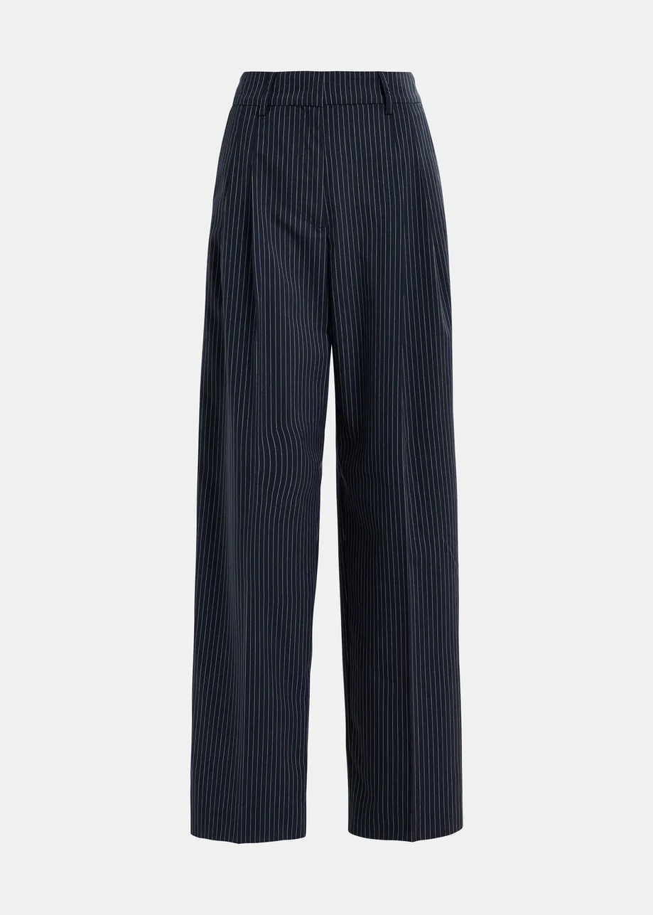 Pantalon fuselé à fines rayures bleu foncé et blanc