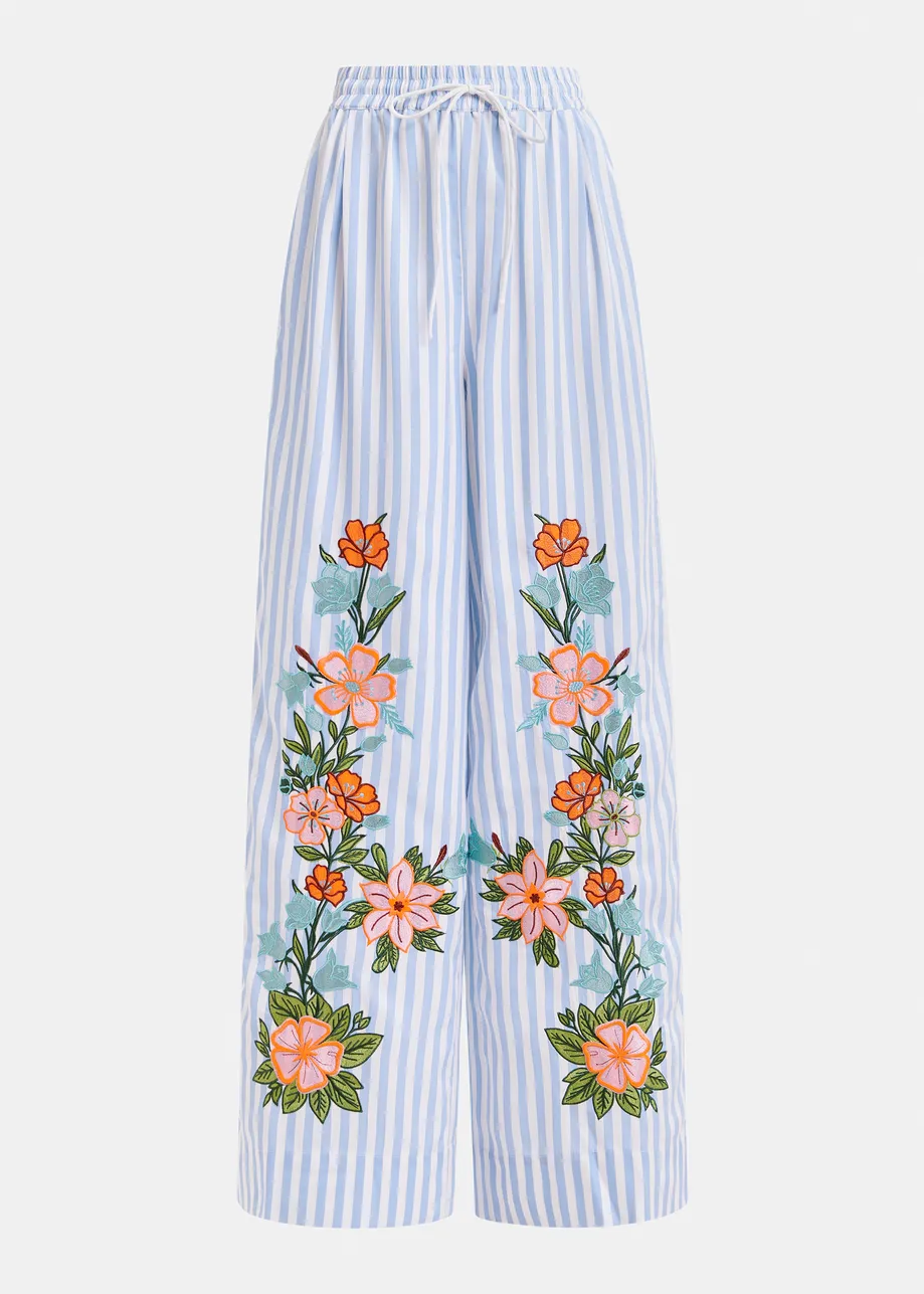 Blue, white and multicolored wide-leg pants with contrast border and embroideries