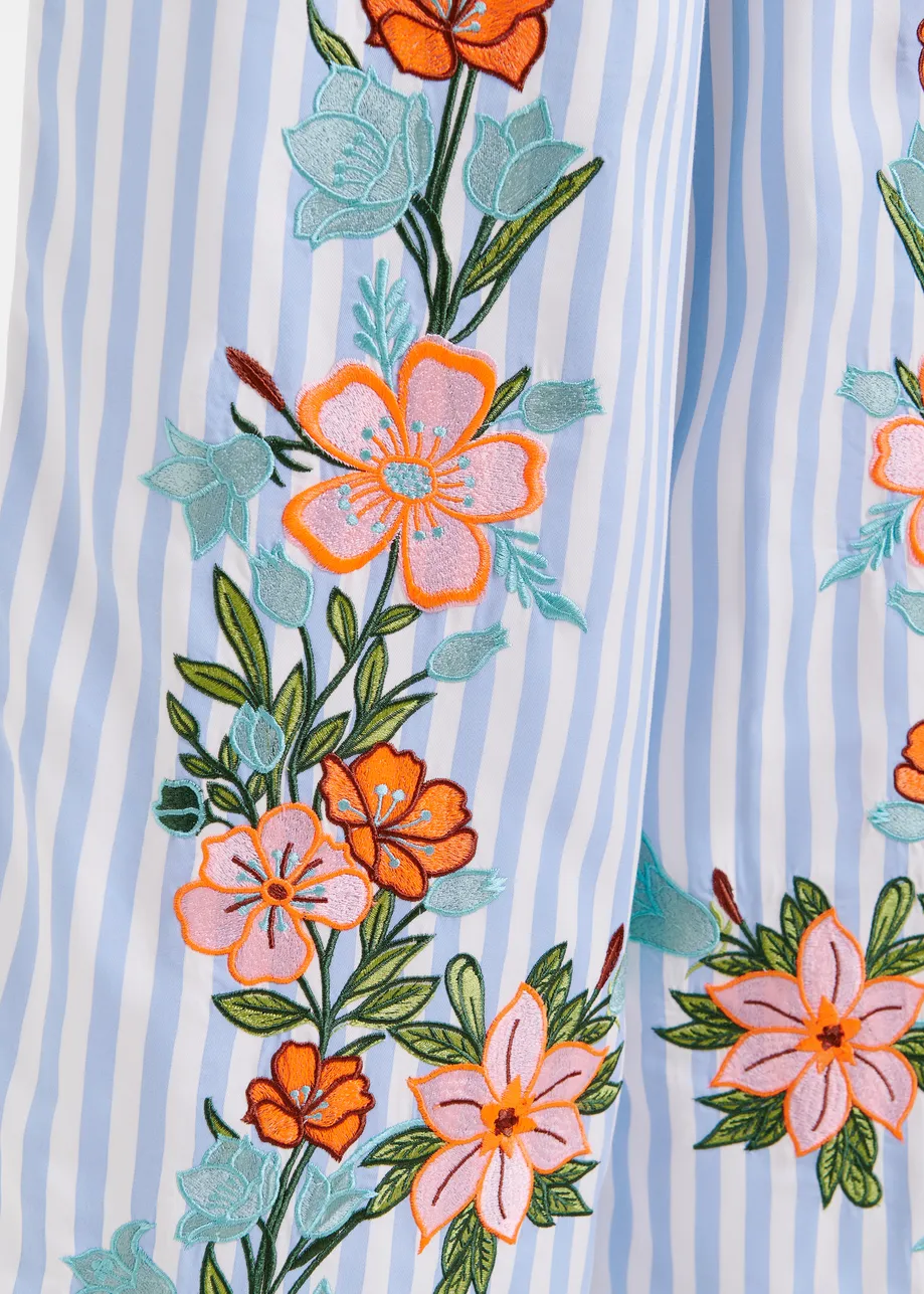 Blue, white and multicolored wide-leg pants with contrast border and embroideries