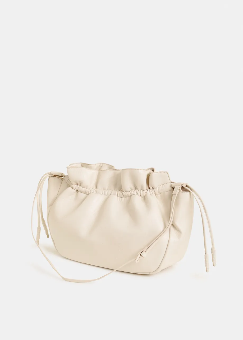 Gepolsterte Schultertasche in Creme