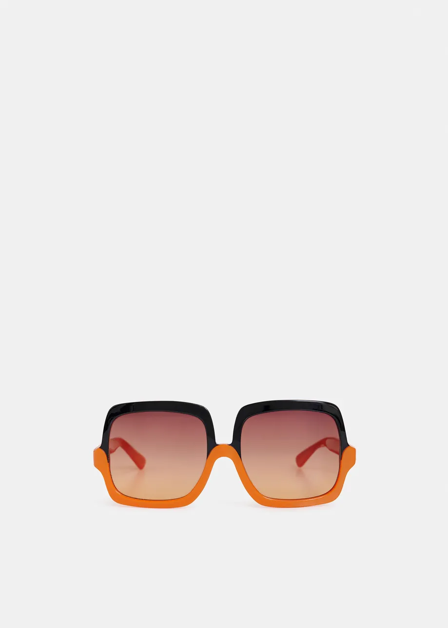Zweifarbige Oversized Sonnenbrille in Orange und Schwarz