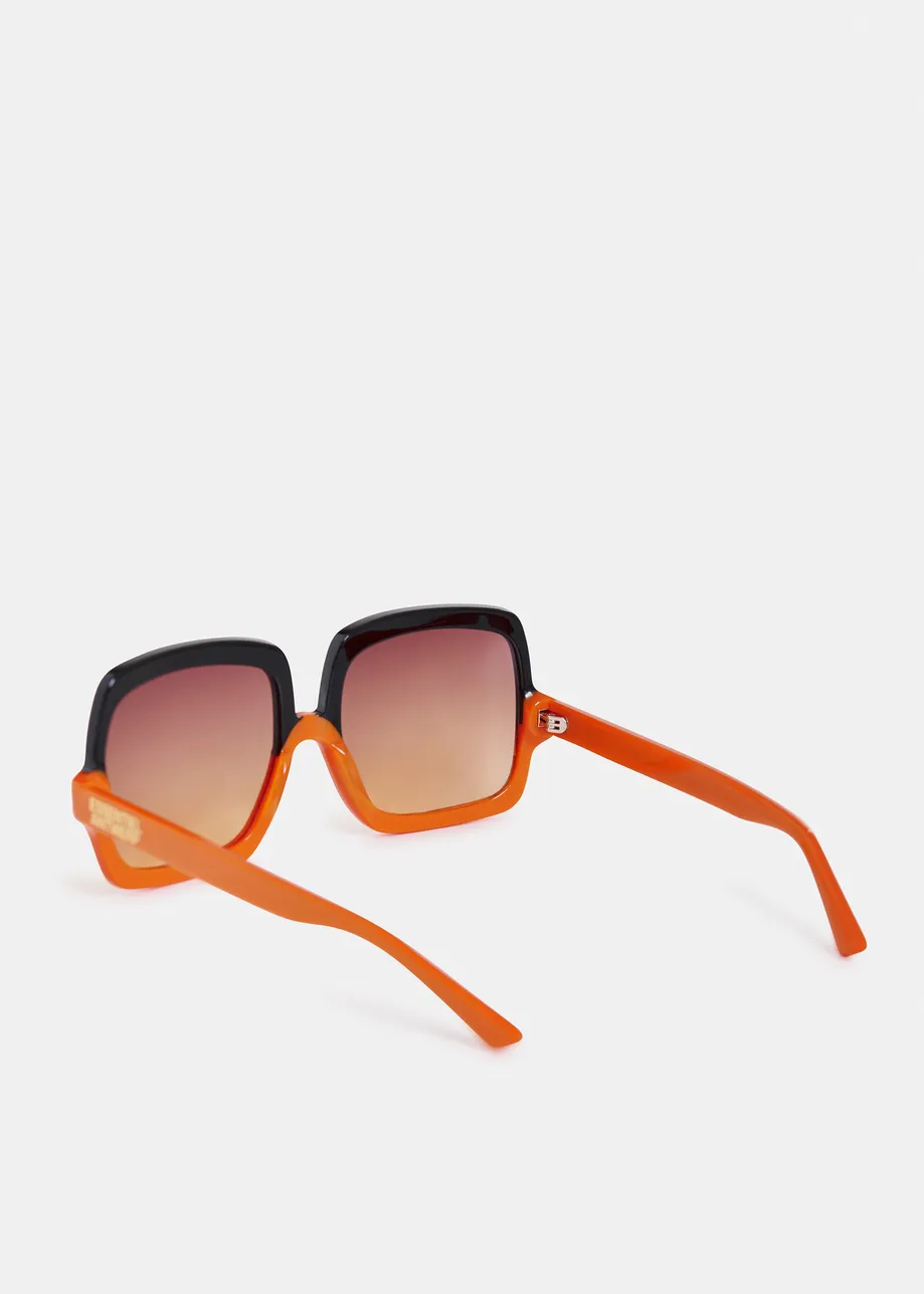 Orange and black oversized two-tone sunglasses