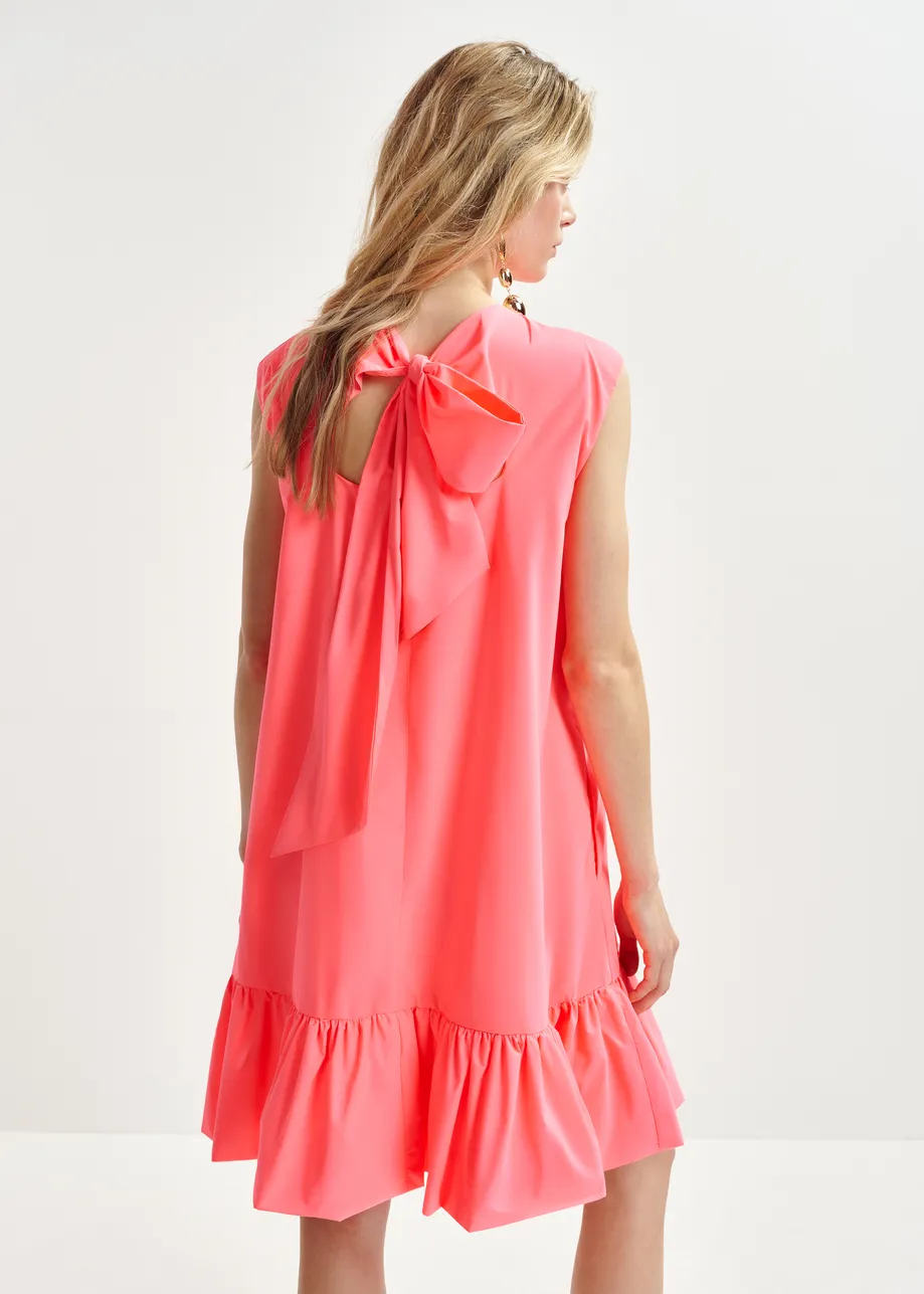 Coral ruffled mini dress with open-back and bow detail